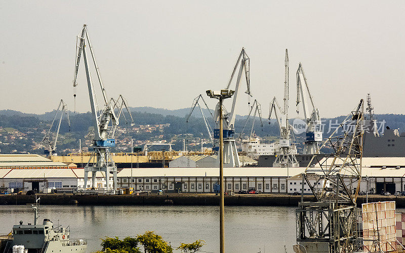 Harbor cranes in Ferrol, A Coruña province, Galicia, Spain.